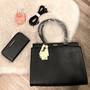 Classy Black bag with strap and gold details. includes matching wallet
